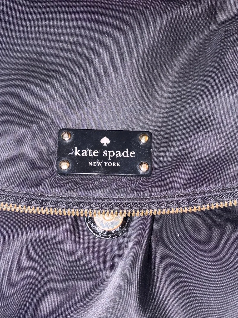 kate spade black nylon backpack with gold-tone hardware